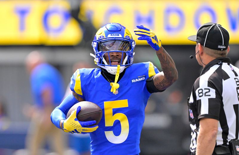 Oct 8, 2023; Inglewood, California, USA; Los Angeles Rams wide receiver Tutu Atwell (5) celebrates after scoring a touchdown in the first half against the Philadelphia Eagles at SoFi Stadium. Mandatory Credit: Jayne Kamin-Oncea-USA TODAY Sports