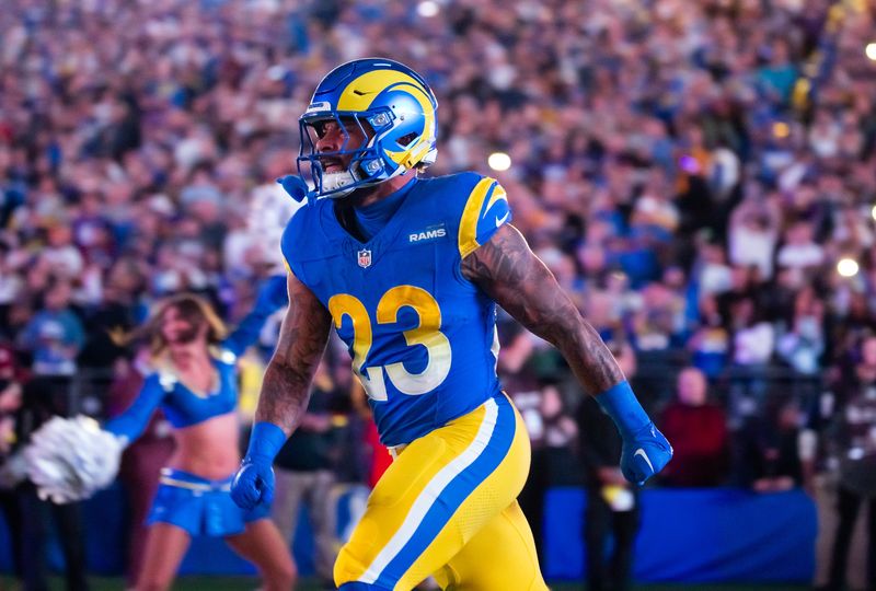 Jan 13, 2025; Glendale, AZ, USA; Los Angeles Rams running back Kyren Williams (23) against the Minnesota Vikings during an NFC wild card game at State Farm Stadium. Mandatory Credit: Mark J. Rebilas-Imagn Images