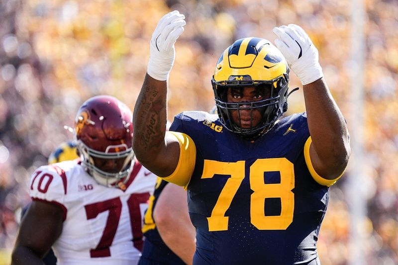 Michigan defensive lineman Kenneth Grant (78) celebrates a tackle against USC during the first half at Michigan Stadium in Ann Arbor on Saturday, Sept. 21, 2024.