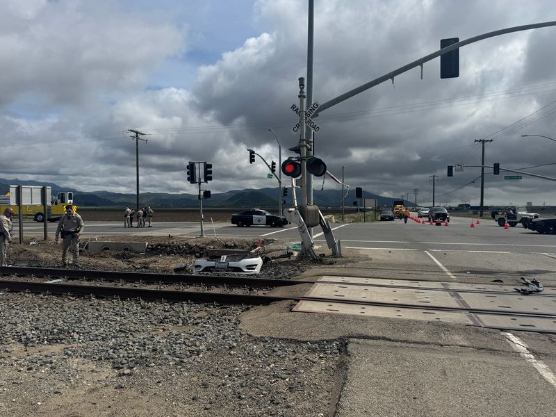 California Highway Patrol officers investigate a fatal crash between a Lincoln SUV and a Metrolink train Monday, March 31, 2025, in Camarillo.