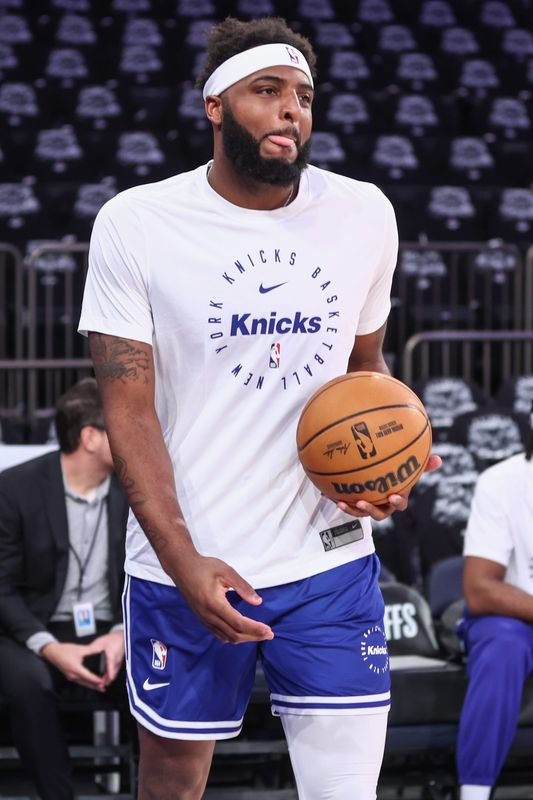 Apr 19, 2025; New York, New York, USA; New York Knicks center Mitchell Robinson (23) warms up prior to Game One of the First Round of the NBA Playoffs against the Detroit Pistons at Madison Square Garden. Mandatory Credit: Wendell Cruz-Imagn Images