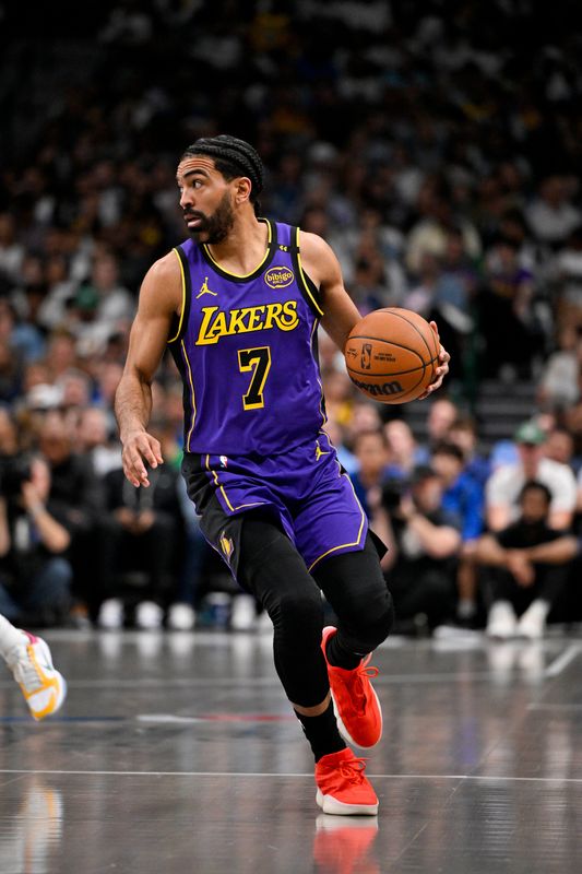 Apr 9, 2025; Dallas, Texas, USA; Los Angeles Lakers guard Gabe Vincent (7) in action during the game between the Dallas Mavericks and the Los Angeles Lakers at American Airlines Center. Mandatory Credit: Jerome Miron-Imagn Images