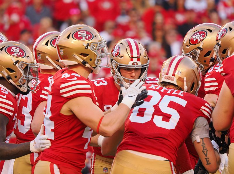 Jan 28, 2024; Santa Clara, California, USA; San Francisco 49ers quarterback Brock Purdy (13) huddles with teammates against the Detroit Lions during the first half of the NFC Championship football game at Levi's Stadium. Mandatory Credit: Kelley L Cox-USA TODAY Sports