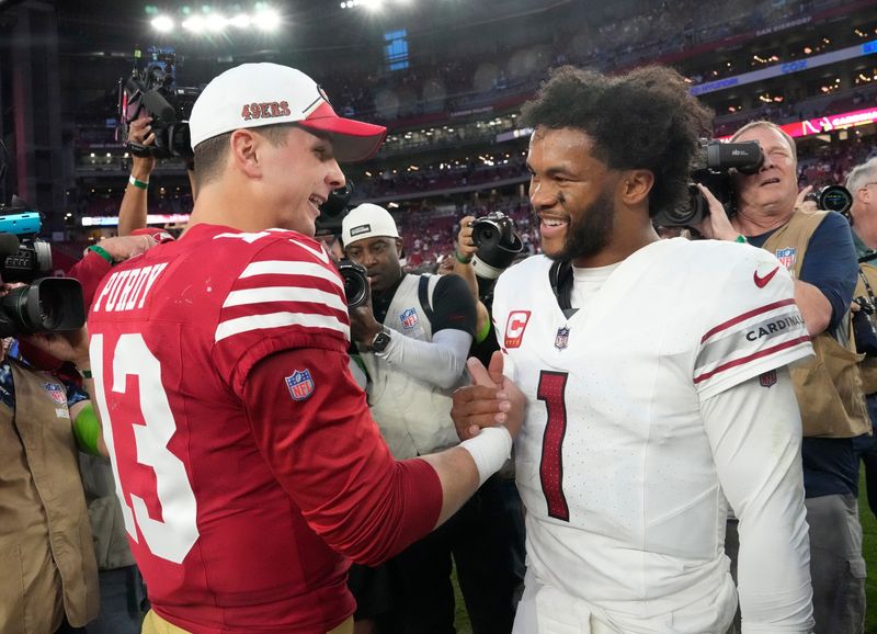 Dec 17, 2023; Glendale, Ariz, United States; Arizona Cardinals quarterback Kyler Murray (1) congratulates San Francisco 49ers quarterback Brock Purdy (13) after losing 45-22 at State Farm Stadium. Mandatory Credit: Michael Chow-Arizona Republic