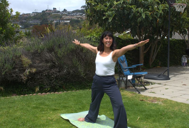 Valley fever put Tammy Takara, an exercise enthusiast who all but lives outside, out of action for about six weeks. Here, she does yoga at her Ventura home on May 28.
