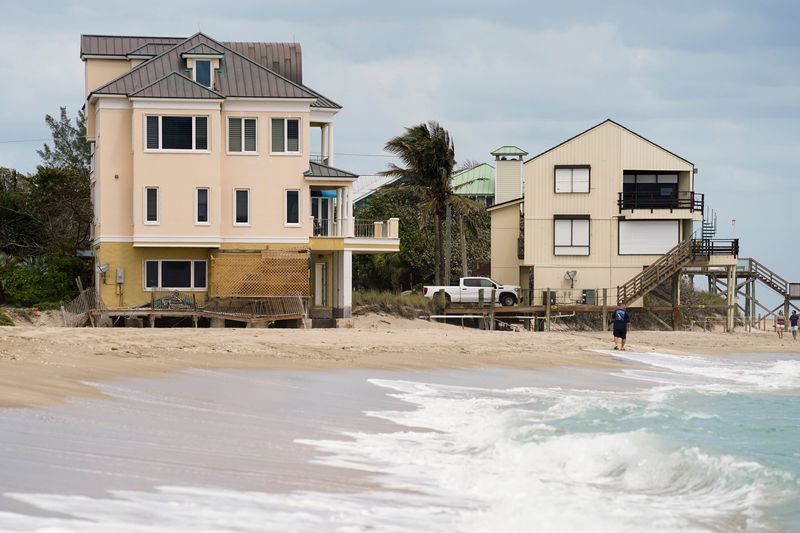As water moves closer to waterfront property, sea level rise threatens Hutchinson Island properties on Saturday, April 3, 2021, in Martin County. Legislation has been introduced to tackle the risks associated with sea level rise. Spanning several bills, the Always Ready: Flooding & Sea Level Rise Act would allocate up to $100 million each year to bolstering at-risk coastal infrastructure and direct the Florida Department of Environmental Protection to conduct a statewide flood vulnerability and sea level rise assessment. Senate Bill 1954, the lead bill in the package, is expected to be voted on by the Senate this week.