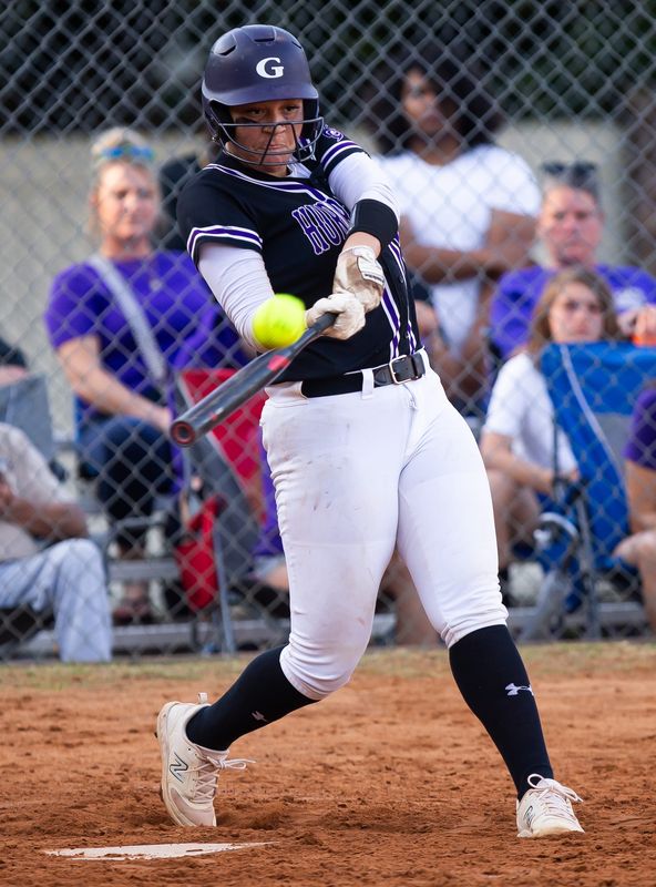 Gainesville Hurricanes Braylin Cook (27) hits her second home run of the night in the bottom of the third making the score 5-1 Gainesville. Gainesville High School hosted Columbia High School in softball at Gainesville High School in Gainesville, FL on Tuesday, April 30, 2024. Gainesville High School won 10-3. [Doug Engle/Gainesville Sun]