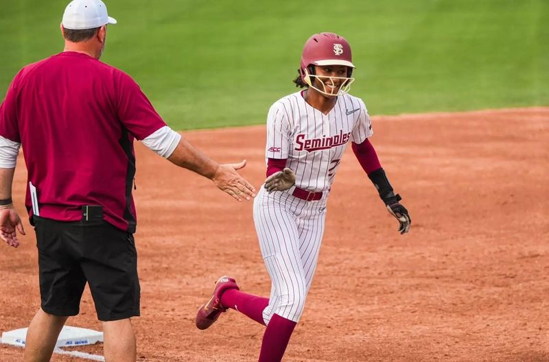 Freshman Kennedy Harp walks her way to home base after leading off with a home run to set the tone for FSU softball in its victory 2-0 victory over Notre Dame in the ACC quarterfinals.