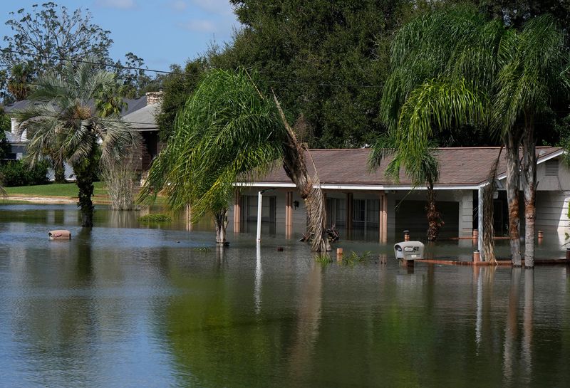 Hurricane Milton flooding covers land on Orange Camp Road in DeLand on Friday, Oct. 11, 2024.