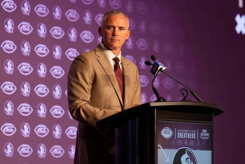 Jul 22, 2024; Charlotte, NC, USA; Florida State head coach Mike Norvell speaks to the media during ACC Kickoff at Hilton Charlotte Uptown. Mandatory Credit: 
Jim Dedmon-USA TODAY Sports