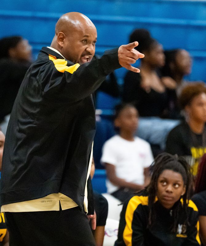 Rutherford Rams head coach Tony Davis head coach Tony Davis coaches from the sideline. The Rutherford Rams played the Bolles Bulldogs in the FHSAA Region 1-3A girls basketball final at Bolles School in Jacksonville, Fla. Friday night, February 21, 2025. Bolles defeated Rutherford 52-38. [Doug Engle/Florida Times-Union]2025