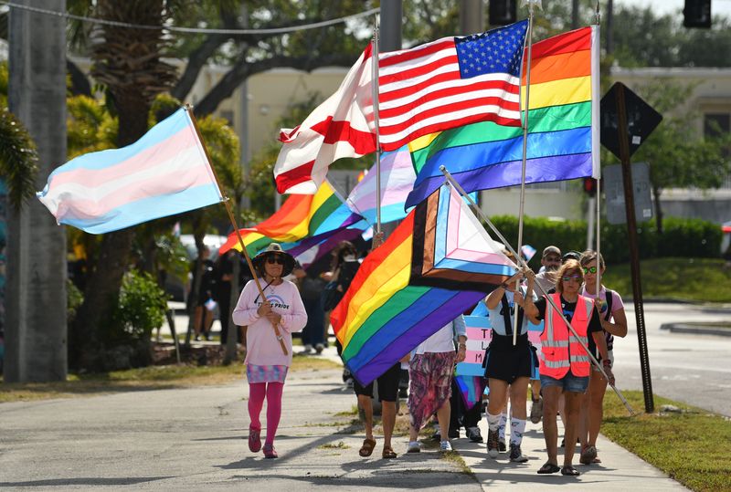 A crowd of around 250 people gathered Sunday at Eau Gallie Square Park in honor of Transgender Day of Visibility, celebrating with music, speakers, vendors and a march across the Eau Gallie Causeway. The annual event is celebrated around the world on March 31 and honors transgender, nonbinary and gender-expansive people while drawing attention to disproportionate levels of poverty, discrimination and violence the community faces globally.