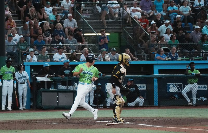 Daytona's Sammy Stafura (32) scores a run as Bradenton's catcher waits for the throw, Friday, April 4, 2025 at Jackie Robinson Ballpark in Daytona Beach.