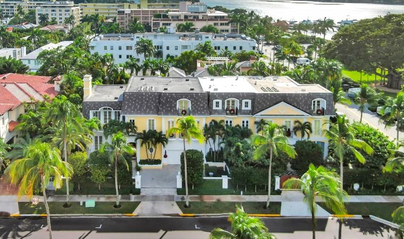 A Palm Beach townhouse in a luxury duplex at 450 Brazilian Ave. near the Palm Beach Marina has sold for a recorded $12.125 million. The townhouse occupies the left half of the building.