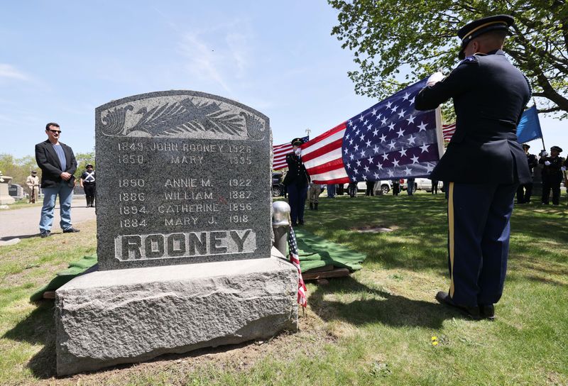 Massachusetts National Army Guardsmen-Military Funeral Honors fold the American flag for U.S. Army veteran John Rooney of Brockton, who was laid to rest at Calvary Cemetery in Brockton on Tuesday, April 29, 2025.