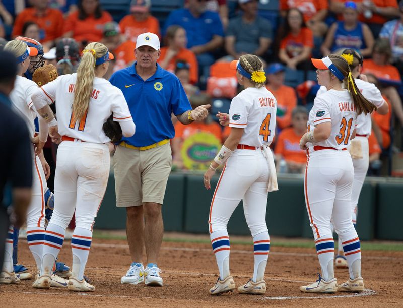 Florida Head Coach Tim Walton has a mound conference during a NCAA softball game at Katie Seashole Pressly Stadium in Gainesville, FL on Saturday, May 3, 2025. [Alan Youngblood/Gainesville Sun]