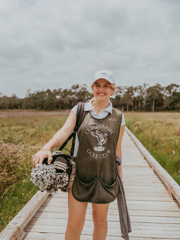 Isabella "Bella" Cecere recently won the Evans scholarship, a full housing and tuition college grant offered to golf caddies.