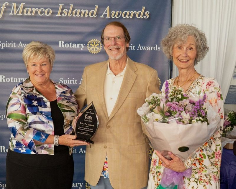 Noontime Rotary President Sue Haviland awards the Spirit Award to Scot and Pat Kaufman, who have donated $4 million to the construction of the new 25,000 sq. ft. NCH Urgent Care Center, which will be known as the Pat and Scot Kaufman Healthcare Center. They also generously provided the funds for the purchase of the building that will be the new home for the "Our Daily Bread Food Pantry."