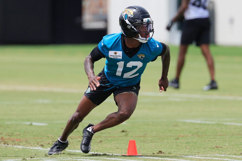 Jacksonville Jaguars wide receiver Travis Hunter (12) runs a route during a rookie minicamp at Miller Electric Center Saturday, May 10, 2025 in Jacksonville, Fla. [Corey Perrine/Florida Times-Union]
