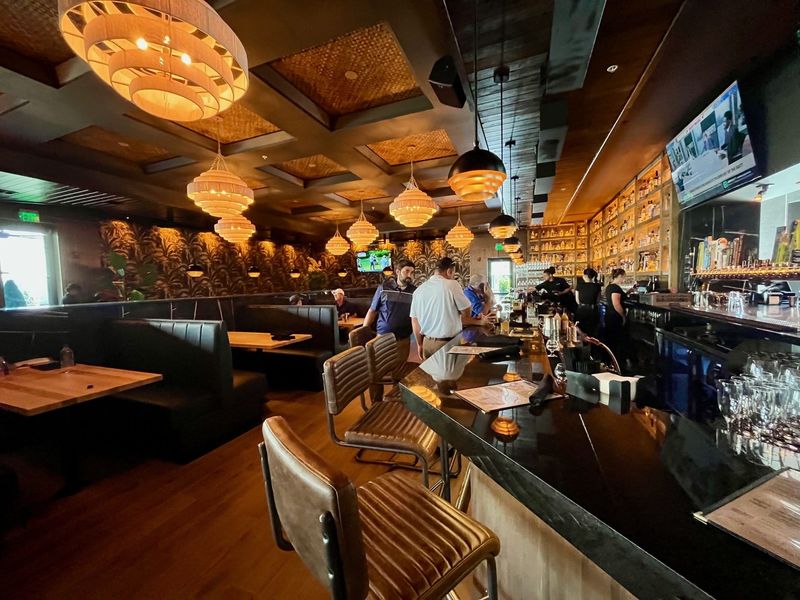 The first-level bar at Tap 42 in Bell Tower is modern and luxurious.