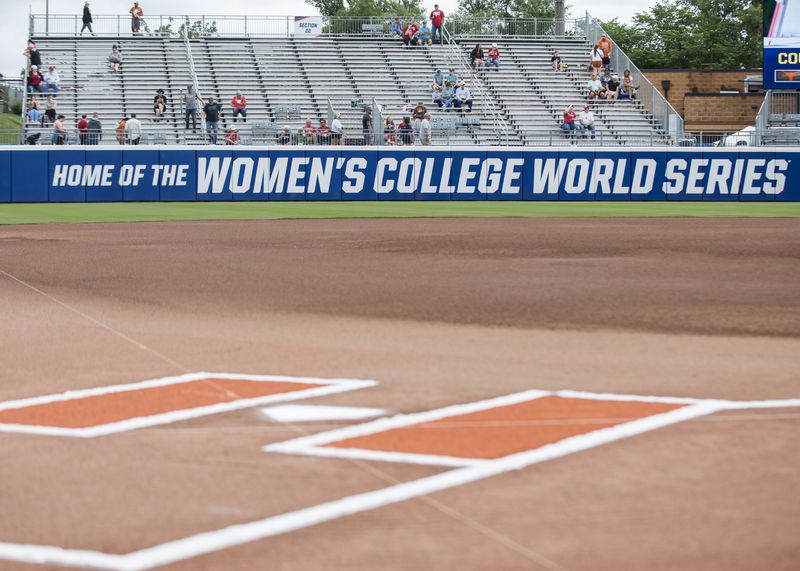 May 29, 2025; Oklahoma City, OK, USA; Fans start filling the outfield bleachers before the start of first game between the Florida Gators and the Texas Longhorns during the NCAA Softball Women's College World Series at Devon Park. Mandatory Credit: Brett Rojo-Imagn Images