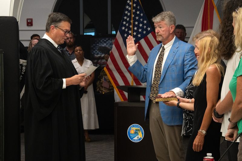 Newly elected Ward 1 Commissioner Robbie Hughes is sworn in on May 28 at Panama City city hall.