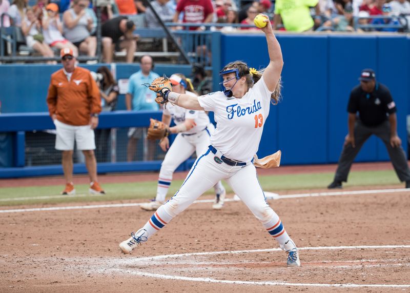 May 29, 2025; Oklahoma City, OK, USA; Florida Gators pitcher livia Miller (13) throws a pitch in the sixth inning against the Texas Longhorns during the NCAA Softball Women's College World Series at Devon Park. Mandatory Credit: Brett Rojo-Imagn Images