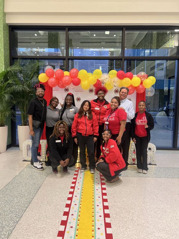 City Year Jacksonville supporter Michael Ward, rear, second right, poses with coaches Za’vion Houston, rear left, Marquette Merritt, Eugina Holsey, Tyasia Saunders, Kai’liyah Austin, Arri Fleming and, front from left, June Sundiang, Kayla Smothers and Bre Devaughn.
