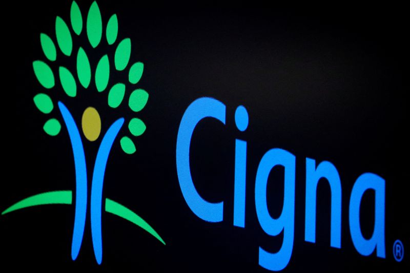 FILE PHOTO: A screen displays the logo fro Cigna Corp. on the floor at the NYSE in New York