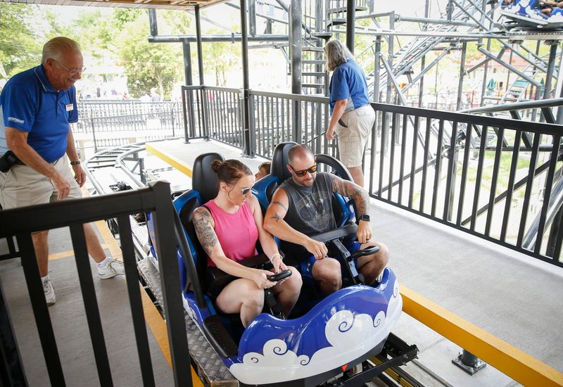 Riders hold on as they depart for a ride on The Phoenix, the newest thrill ride at Adventureland Park, on Thursday, July 11, 2019, in Altoona.