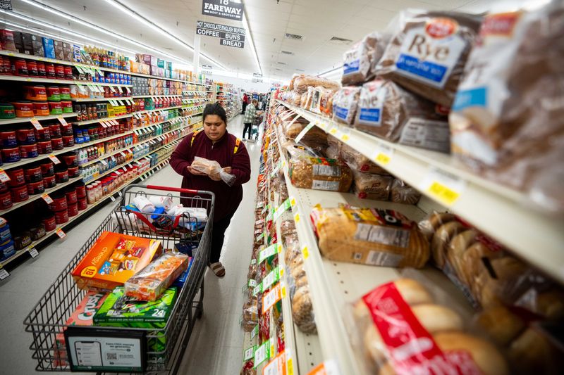 Autumn Barongan grocery shops for her family using her recently replenished EBT on Friday, Nov. 1, 2024, at Fareway in Winterset.
