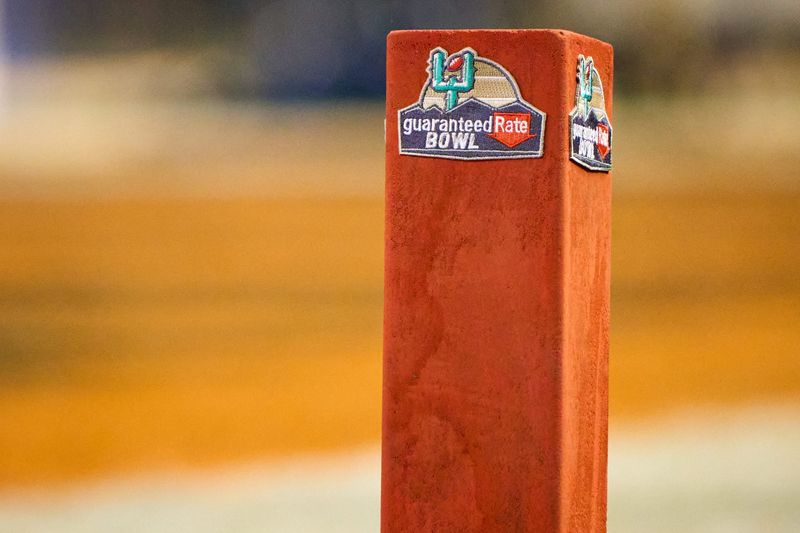 The Guaranteed Rate Bowl game logo is displayed on a goal pylon during the Guaranteed Rate Bowl Game at Chase Field on Tuesday, Dec. 27, 2022.

Ncaa Guaranteed Rate Bowl