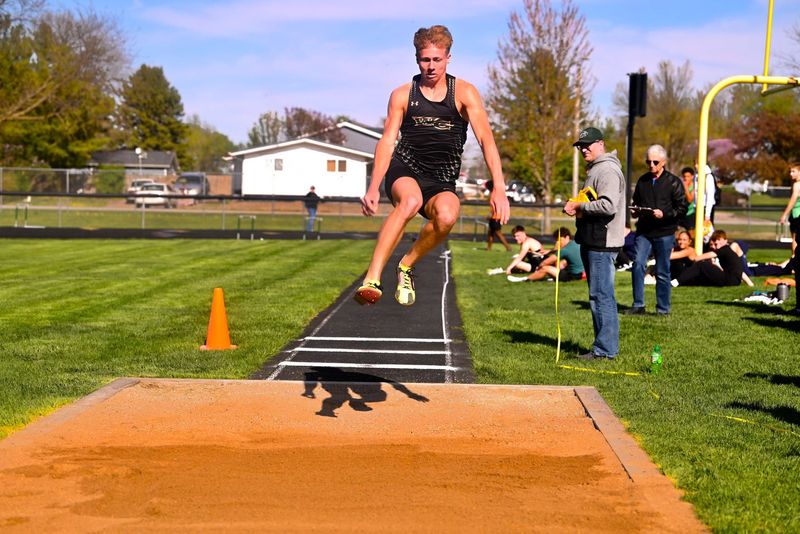 Woodward-Granger's Cael Leighton competes in the long jump on Tuesday, April 29, 2025, at Hawk Stadium in Woodward.