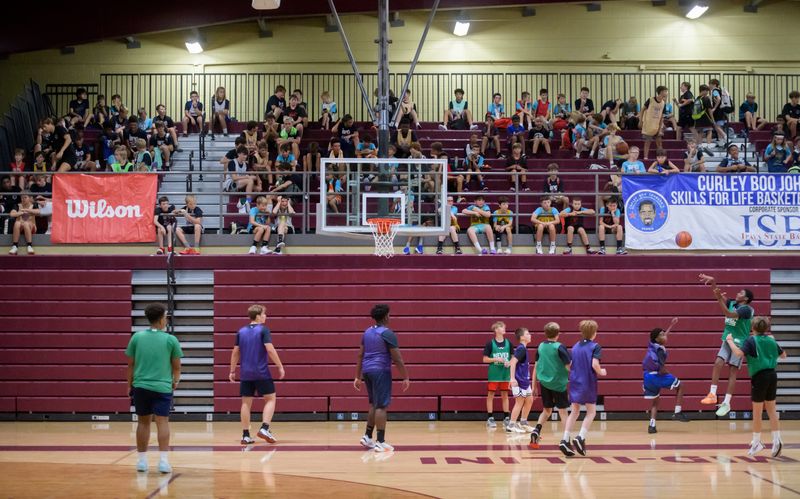 A player puts up a last-second shot during a game at Curley Boo Johnson’s annual Skills for Life Academy basketball camp Monday, Aug. 5, 2024 at Dunlap High and Middle schools. The weeklong camp is intended for youth basketball players between 9 and 14 years old.