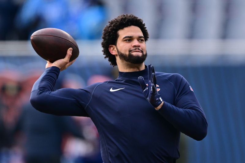 Dec 22, 2024; Chicago, Illinois, USA; Chicago Bears quarterback Caleb Williams (18) warms up before a game against the Detroit Lions at Soldier Field. Mandatory Credit: Daniel Bartel-Imagn Images
