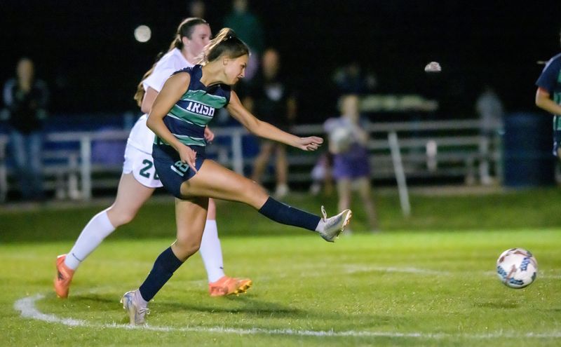 Peoria Notre Dame’s Ava Lafollette (18) takes a shot at the Richwoods goal in the second half of their girls high school soccer match Wednesday, April 23, 2025 at PND High School. The match ended in a scoreless tie.