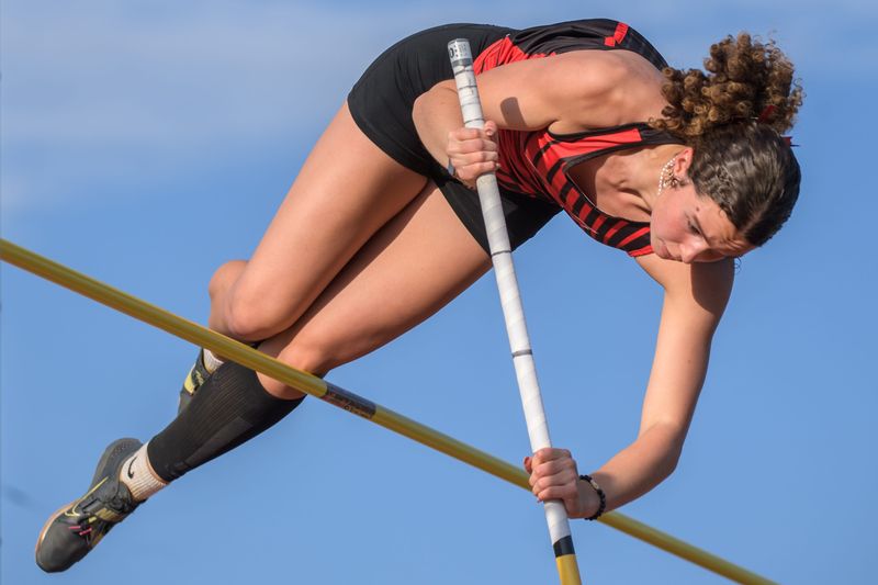 Metamora’s Violet Weinman clears the pole vault bar during the Mid-Illini Girls Track and Field Championships on Wednesday, May 7, 2025 at Metamora High School.