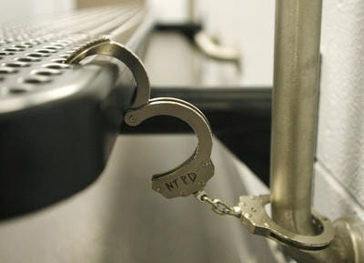 A Plainfield man has been arrested and cash, cocaine and a gun were seized by police following an execution of a search warrant at his Front Street apartment.