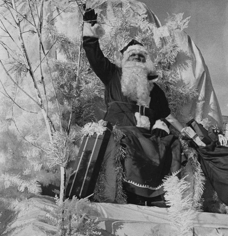 10,000 spectators braved the frigid temperatures to greet Santa Claus during the 1964 Christmas parade.