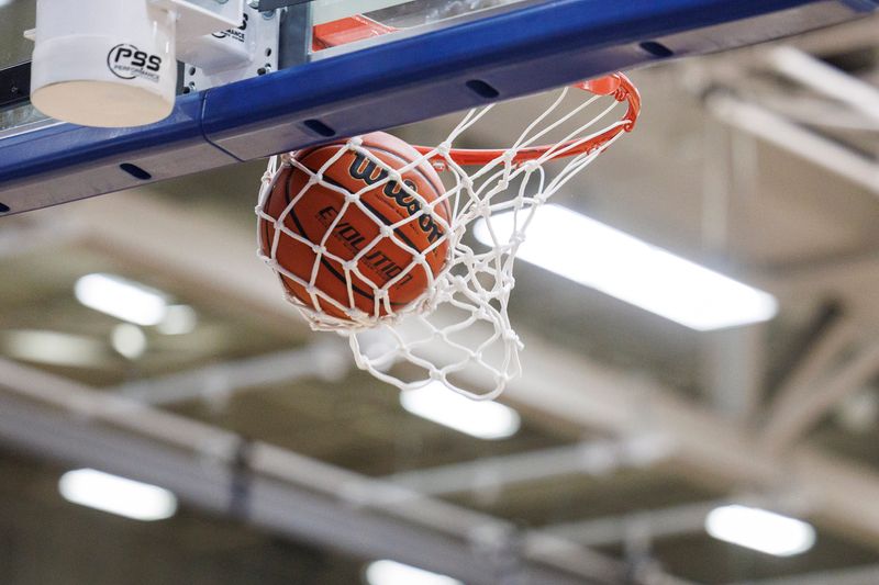 A general view of basketball going through the net during the Manchester-Jimtown high school 2A Semi-State Semi-Final basketball game on Saturday, March 22, 2025, at Michigan City High School in Michigan City, Indiana.