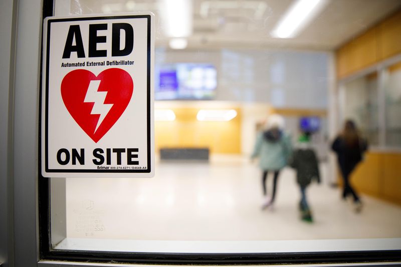 Signage at the entrance of New Prairie High School informs that an automated external defibrillator (AED) is onsite on Tuesday, Feb. 11, 2025, in New Prairie.