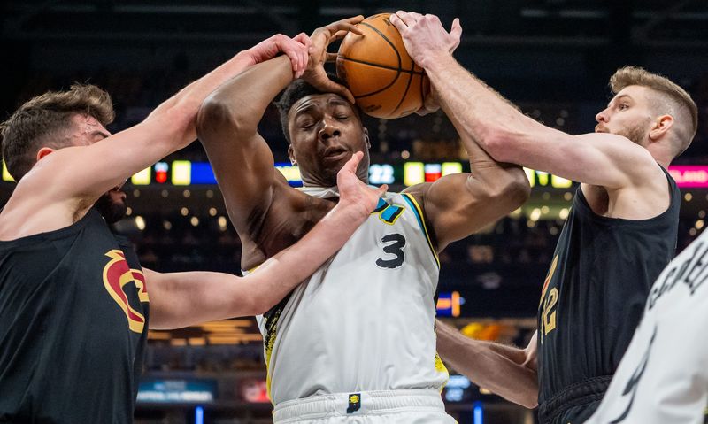 Indiana Pacers center Thomas Bryant (3) is tangled up by the against the Cleveland Cavaliers on Friday, May 9, 2025, during Game 3 of the NBA Eastern Conference semifinals at Gainbridge Fieldhouse in Indianapolis.