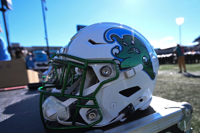 Nov 16, 2024; Annapolis, Maryland, USA; S detailed view of Tulane Green Wave helmet during the second half against the Navy Midshipmen at Navy-Marine Corps Memorial Stadium. Mandatory Credit: Tommy Gilligan-Imagn Images