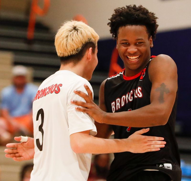 Lafayette Jeff Bronchos Edwin Rodriguez (3) celebrates with Lafayette Jeff Bronchos Joshua Waller (1) Thursday, May 15, 2025, during the IHSAA boys volleyball sectionals match against the Zionsville Eagles at Harrison High School in West Lafayette, Indiana.