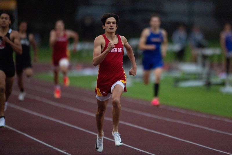 Mater Dei’s Reagan Shaver wins the 400 meter dash during the 2025 IHSAA Boys Track and Field Sectional at Central High School Thursday, May 22, 2025.