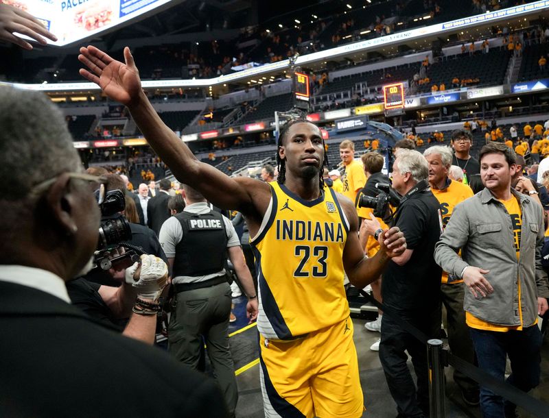 Indiana Pacers forward Aaron Nesmith (23) gets a high five following Game 4 of the NBA Eastern Conference Finals against the New York Knicks on Tuesday, May 27, 2025, at Gainbridge Fieldhouse in Indianapolis. The Pacers defeated the Knicks 130-121.