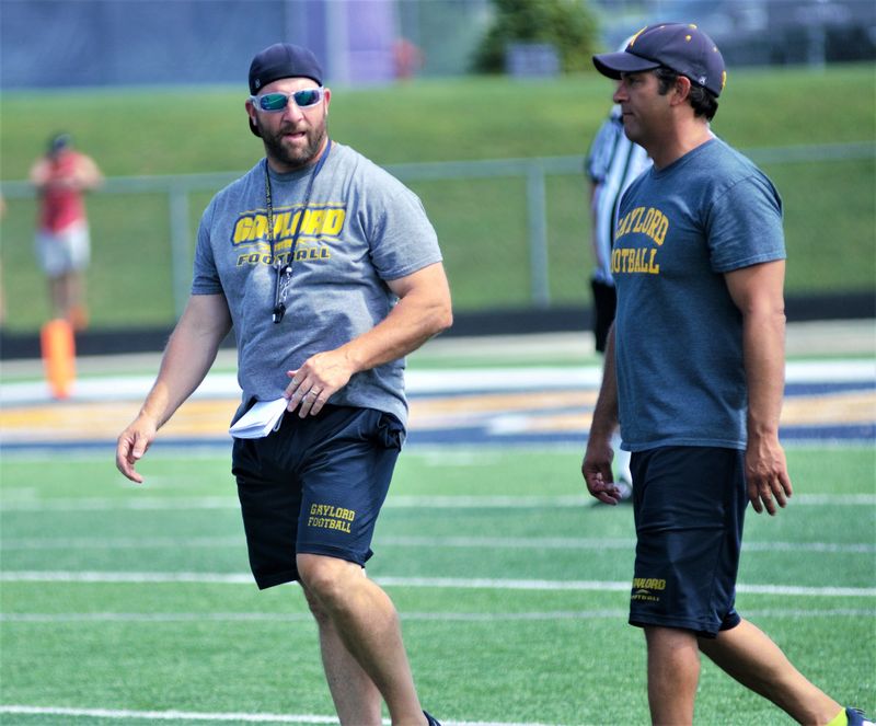 New Gaylord football head coach Matt Silsbury (right) was an assistant on former head coach DJ Szymoniak's (left) staff.