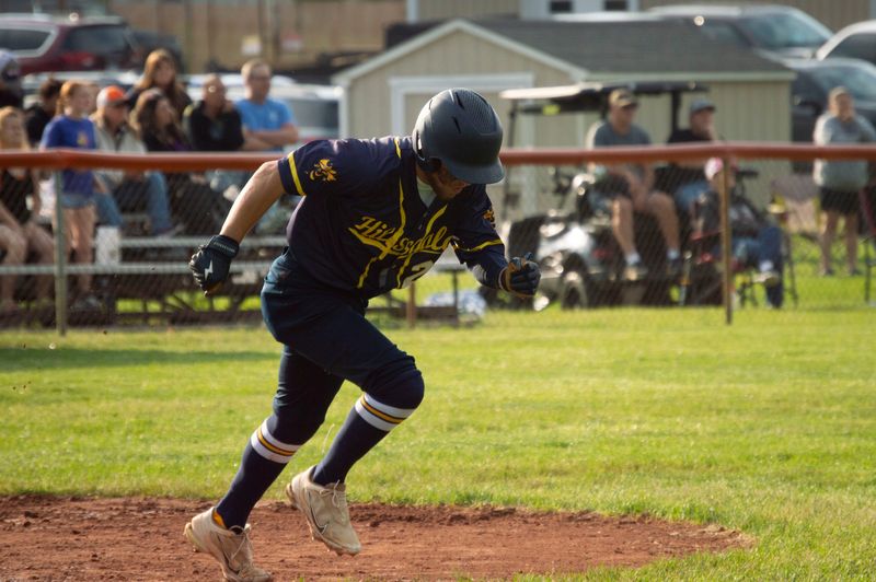 Hillsdale senior Jace Lennox (23) hit a home run in the team's doubleheader against Vandercook Lake.