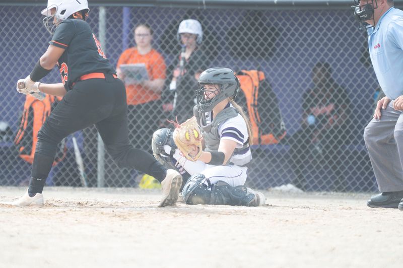 Lakeview sophomore Claire Van Dis catches a pitch during a district game against Jackson at Lakeview High School on Saturday, June 1, 2024.
