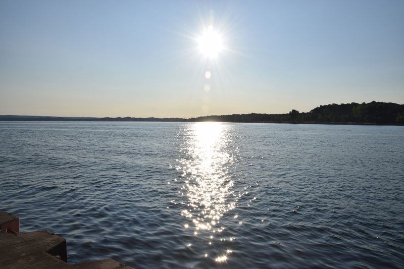 The sun rises over Little Traverse Bay on the morning of July 18, 2024.